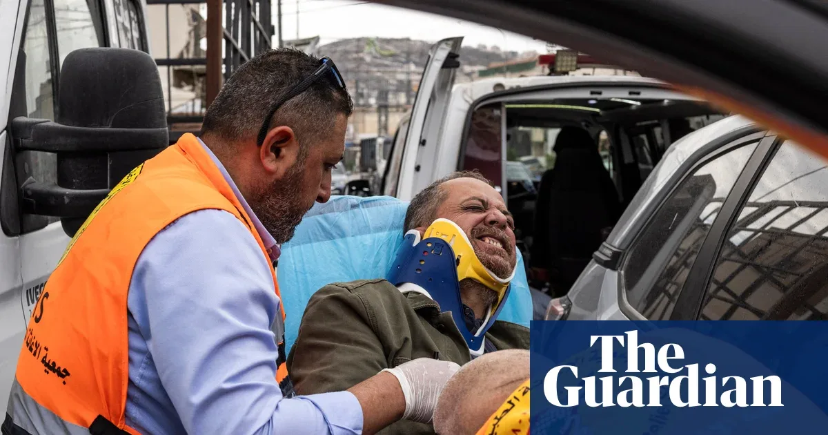 AFP Photographer Assaulted by Israeli Settlers in West Bank, Soldiers Look On